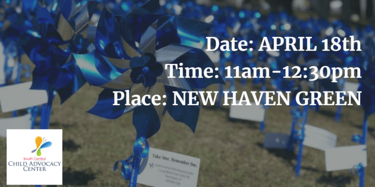 Blue Pinwheels staked in the ground for Child Abuse Awareness